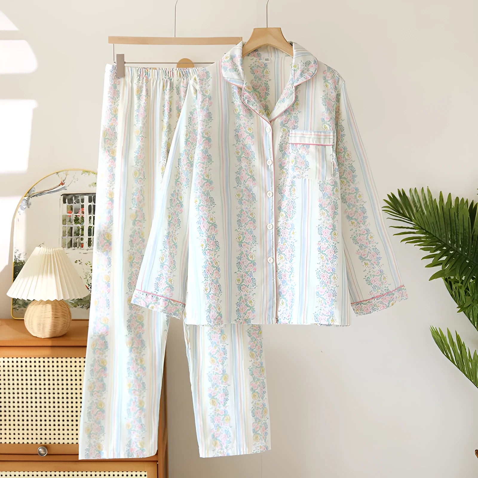 Women's red small fruit patterned cotton gauze long sleeve pyjama top and trousers set.