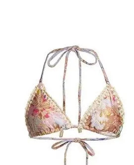Women's floral pattern bikini set with briefs and matching skirt in creamy-white colour