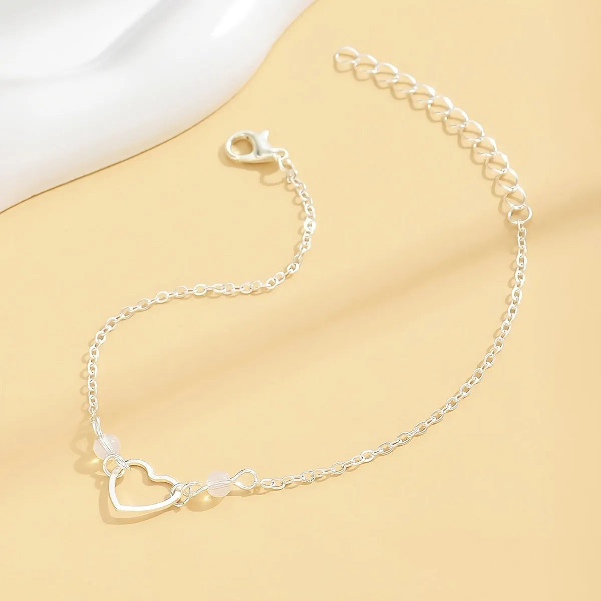 Adjustable women's anklet with heart-shaped pendant in gold or silver geometric jewellery