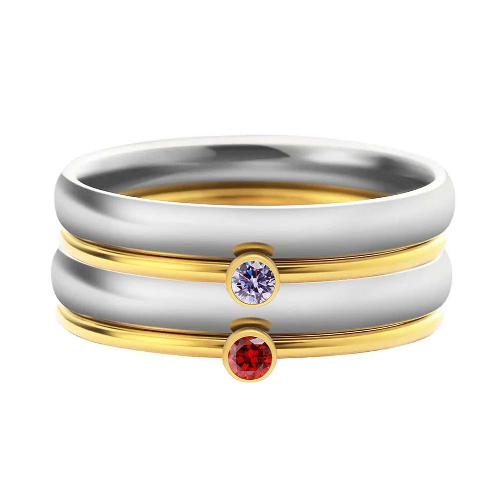 December colour birthstone engraved titanium steel ring with geometric design and two-tone finish.