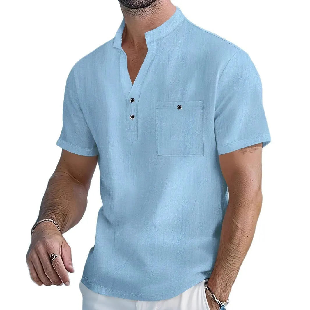 Men's light blue linen blend short sleeve t-shirt with a stand collar, shown in a loose fit.