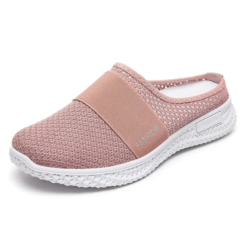 Women's breathable casual shoes with hollow-out mesh upper and flat heel in black, grey, pink, or purple