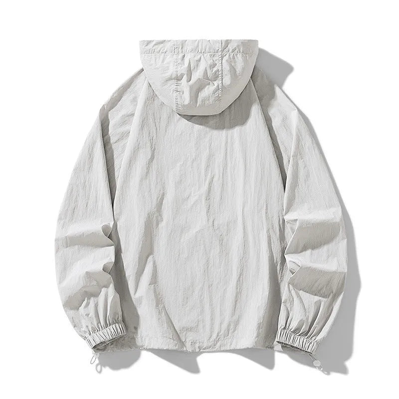 Thin loose fit outdoor sports jacket in various colours on a hanger, showing front and back detail.