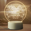 USB-powered acrylic LED night light with modern minimalist design and warm white illumination
