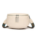 Women's soft PU leather messenger bag in saddle shape with cross-body strap and zipper pocket.