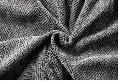Light grey fleece-lined straight-leg trousers with a hollow-out sports design on a hanger.