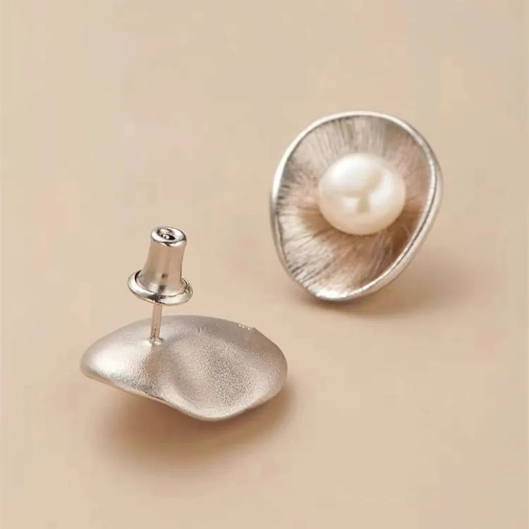 Geometric sterling silver ear studs with pearl elements and electroplated gold finish