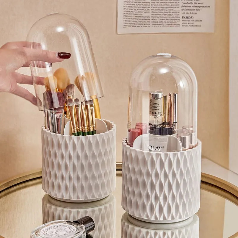 White rotating transparent makeup brush storage organiser with dust cover on desktop