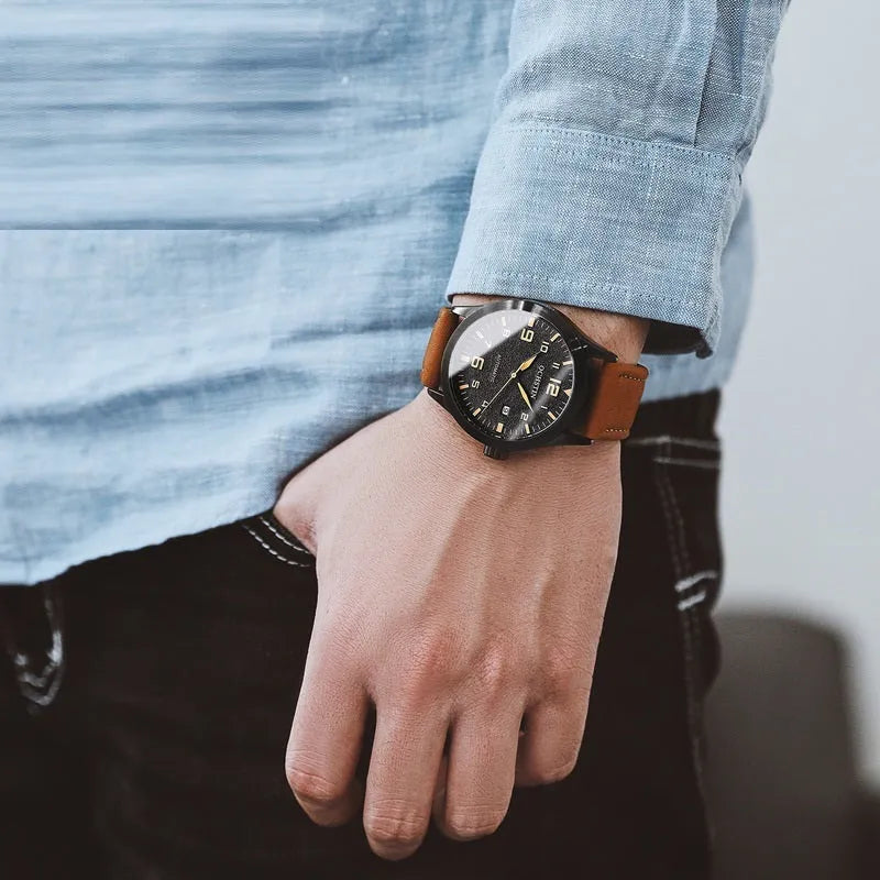 Men's automatic mechanical watch with retro leather strap showing four colour variations