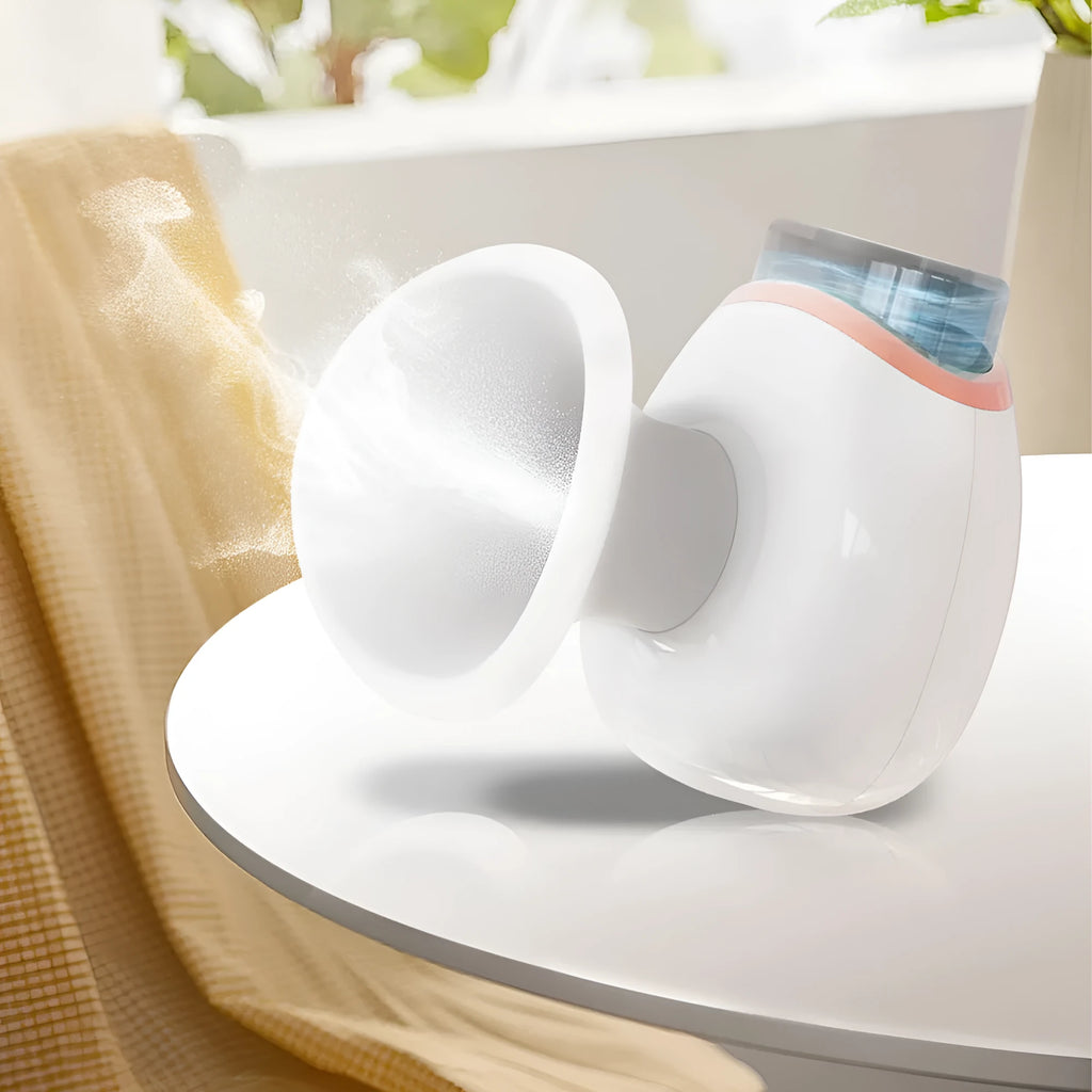 White portable eye humidifier with USB charging cable on a table