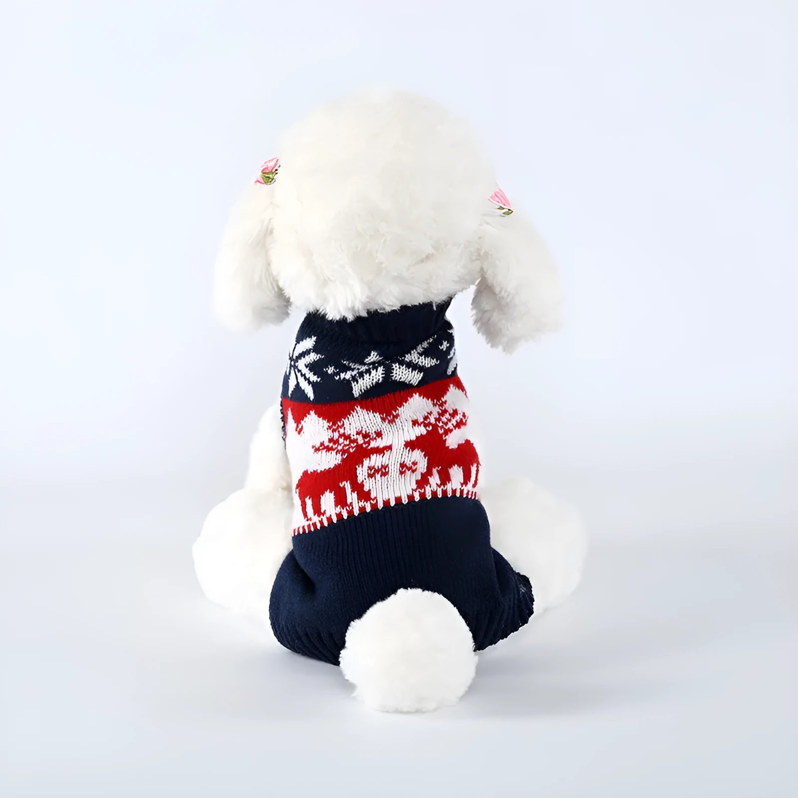 Navy blue Christmas dog sweater with knitted acrylic construction showing festive patterns