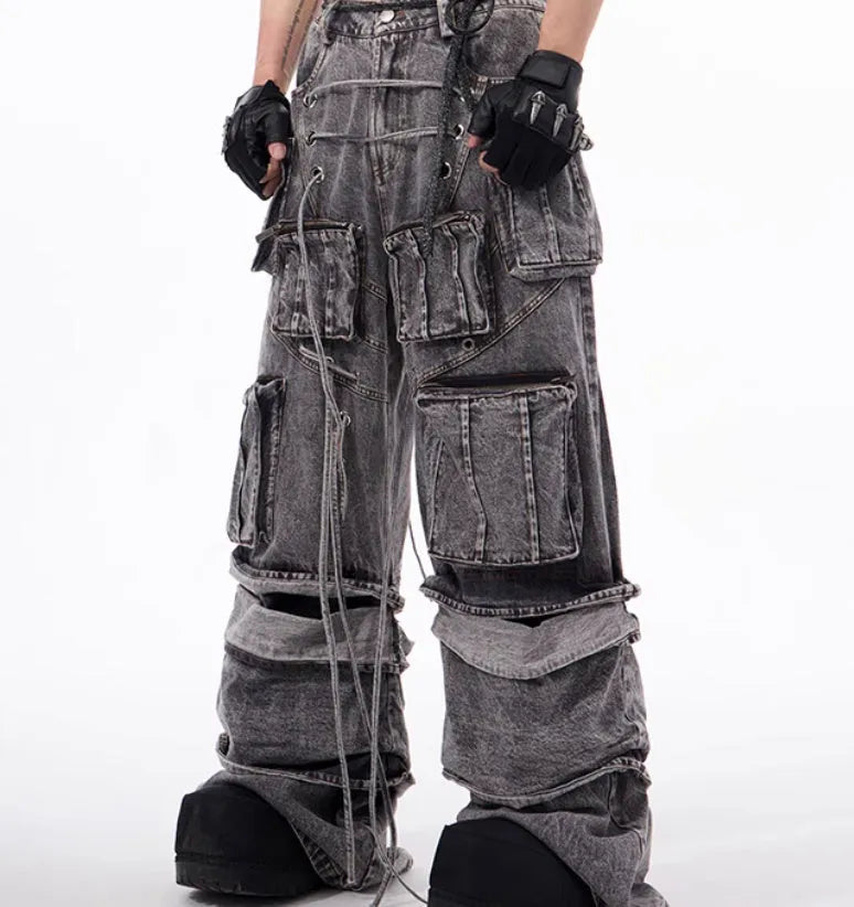 Women's grey distressed denim overalls with mop pant silhouette and rope stitching details