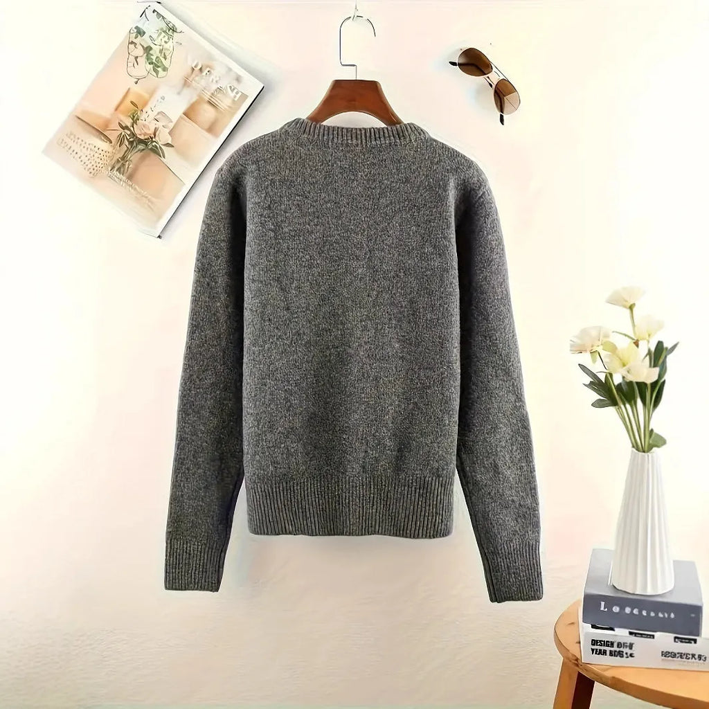 Dark grey solid colour women's cardigan with button front and long sleeves.