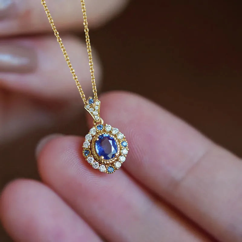 Women's royal necklace with mixed gem pendant on box chain in yellow gold colour