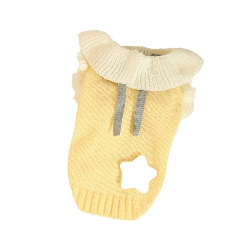 Yellow XINGX style dog sweater on small breed dog showing chest measurement and acrylic fabric