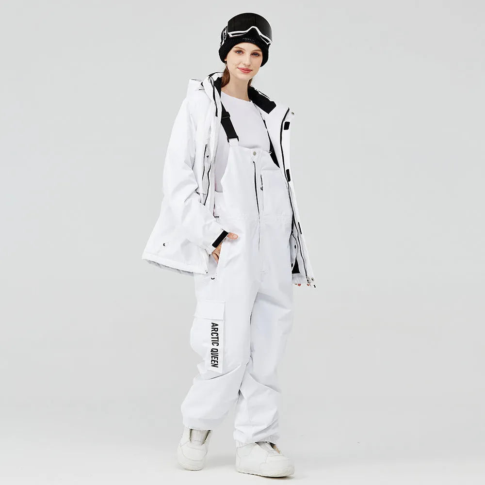 Men's and women's waterproof ski suit in blue with black trousers for winter snow sports