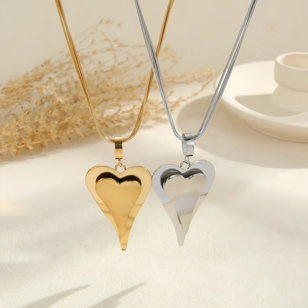 Double heart snake bones geometric pendant necklace in gold or steel finish on regular chain