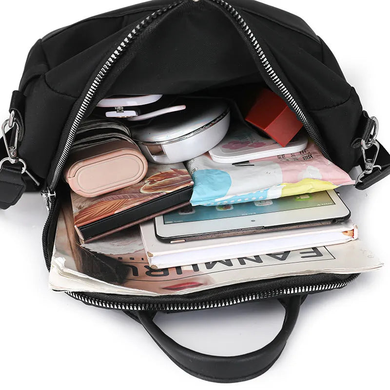 Simple black PU commute backpack with three-dimensional pocket and large capacity