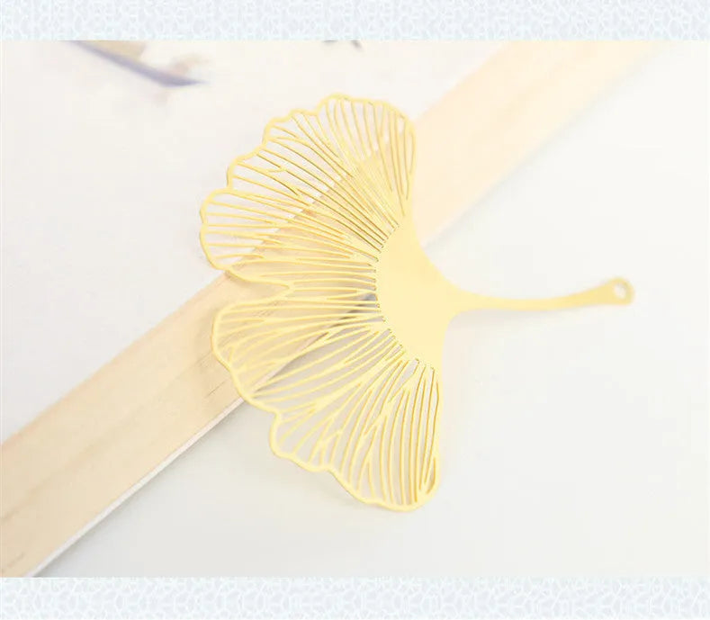 Brass metal hollow plated bookmark with leaf design and rose gold tassel