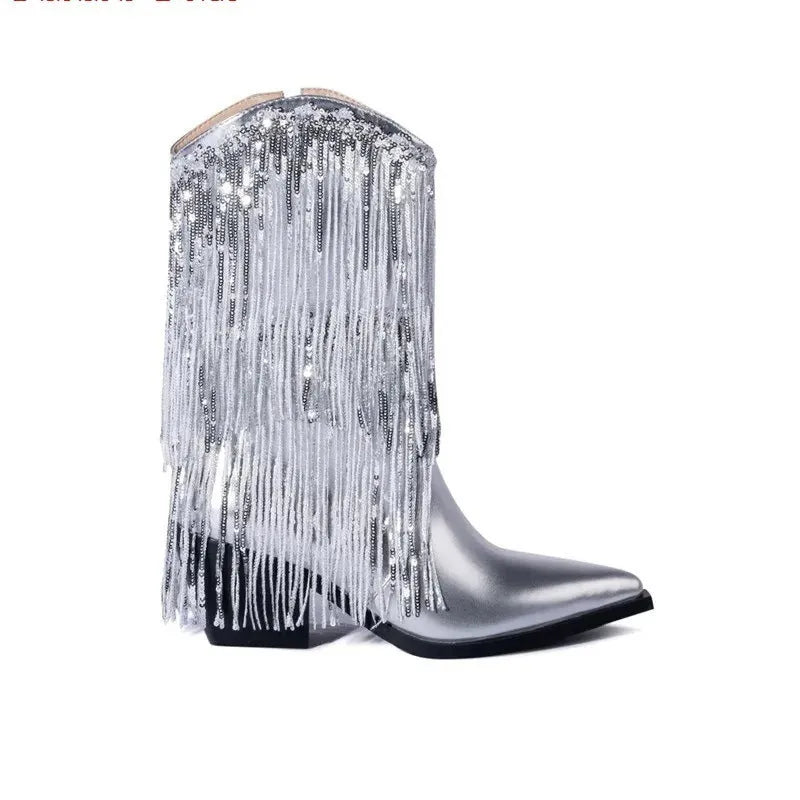 Women's black chunky heel tassel ankle boots with pointed toe on a plain background.