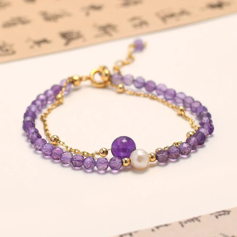 Amethyst-coloured crystal bracelet with diamond-shaped elements in Chinese style design