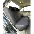 Polyester car seat cover with eyelet stitching in blue, shown on a car seat.