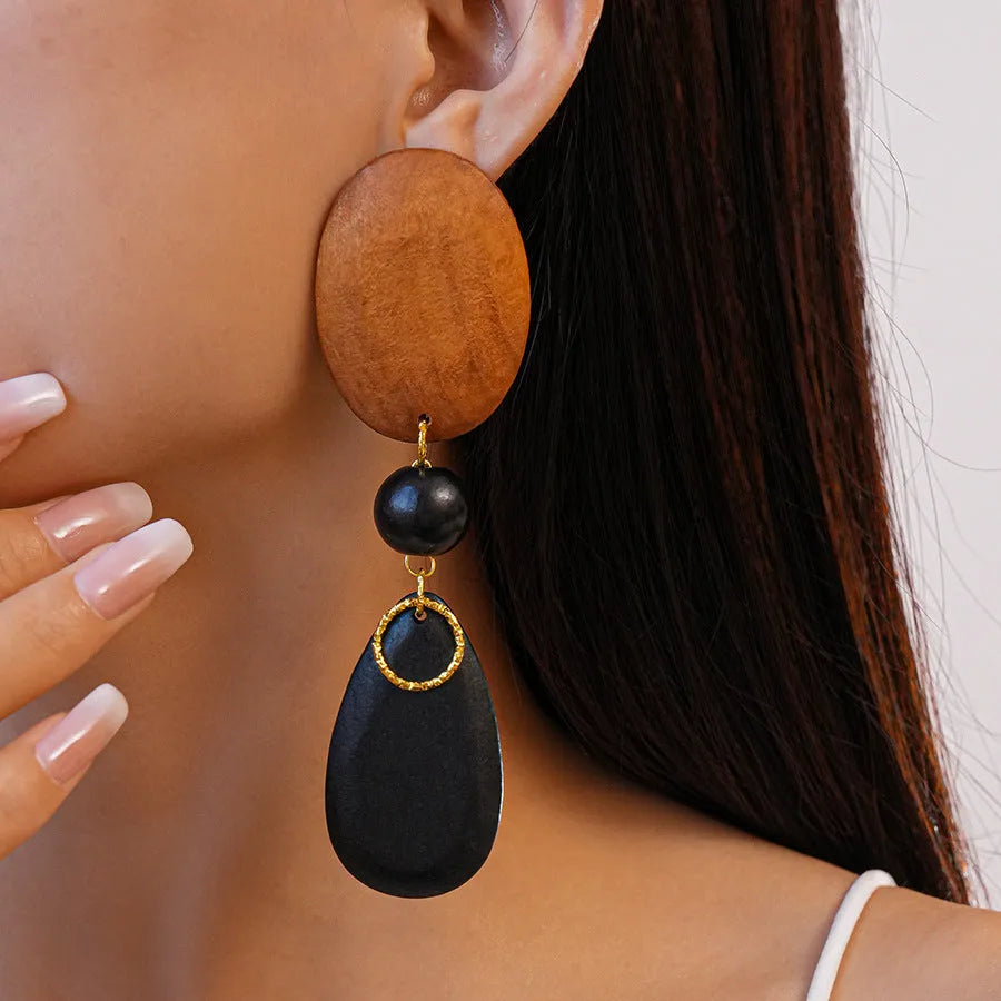 Brown-black wooden retro earrings with elliptical shape and silver needle European American style
