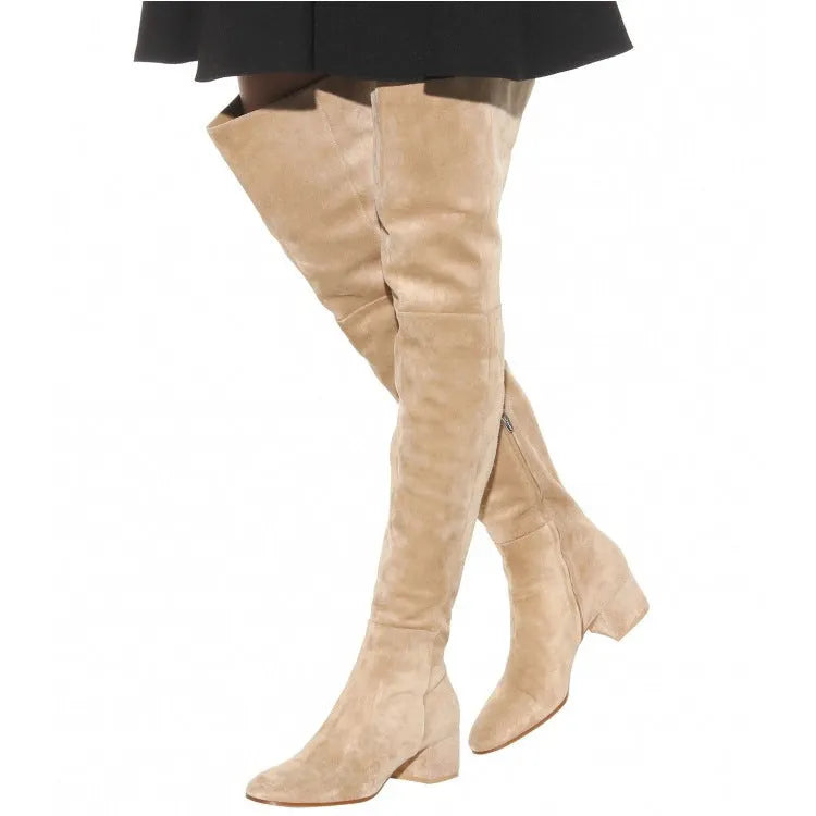 Grey suede women's over-the-knee flat boots with a pointed toe and low thick heel.