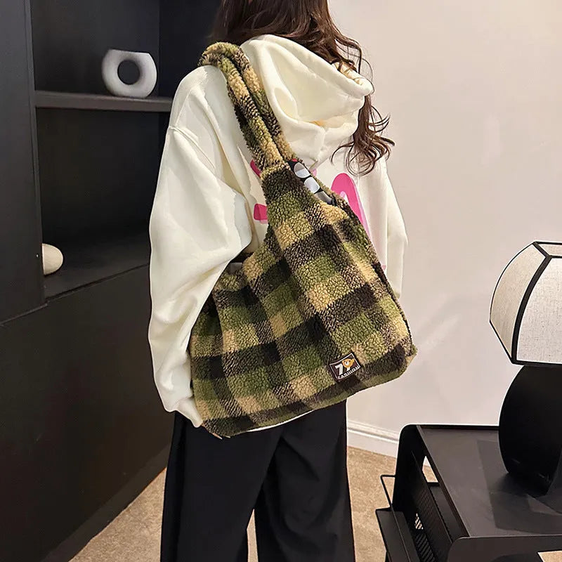 Women's plaid crossbody tote bag in soft plush material with shoulder strap and zippered compartment