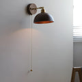 Nordic style bedside wall lamp in walnut or raw wood colour finish with adjustable light tones