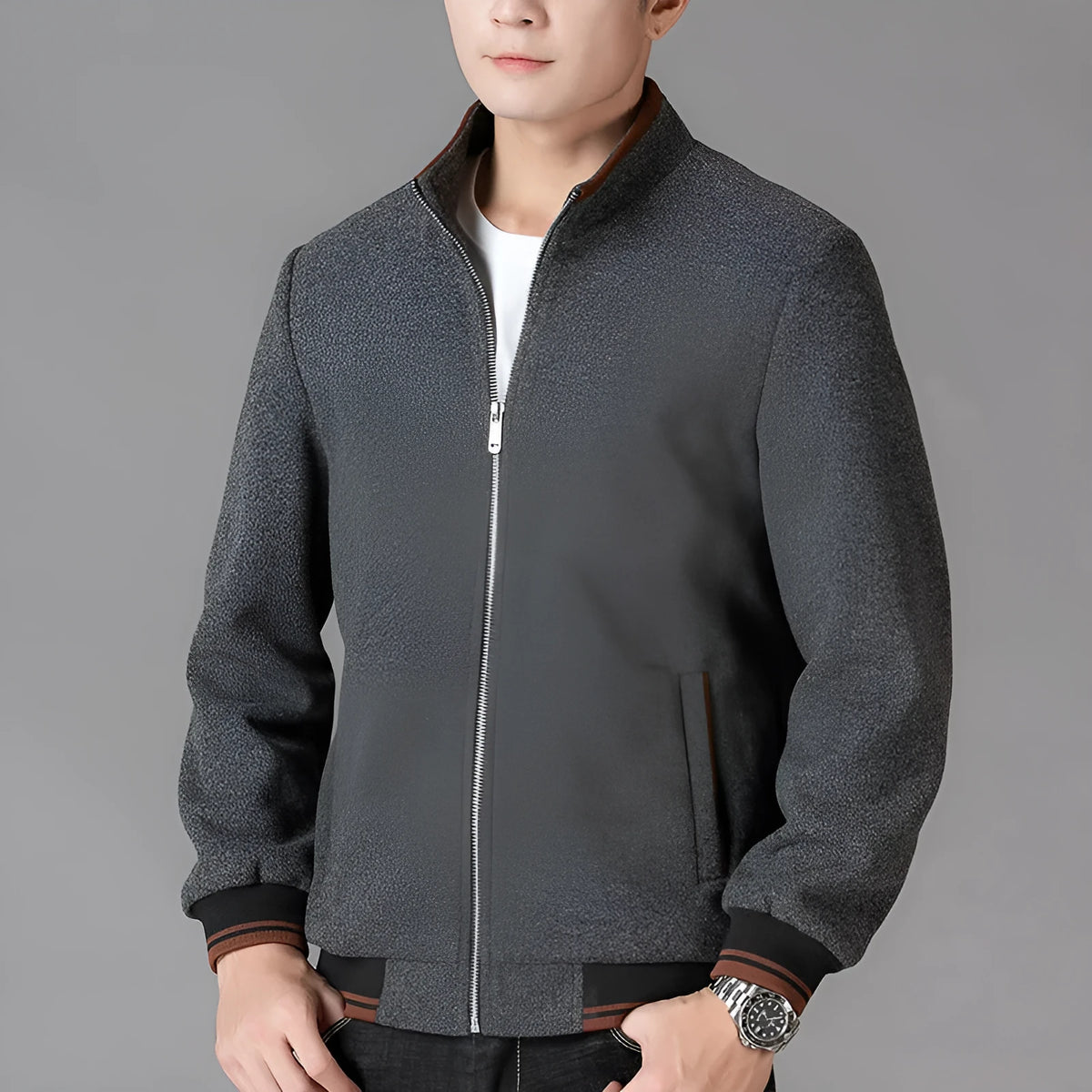 Men's grey sports-style wool fleece jacket with long sleeves and a stick pocket.