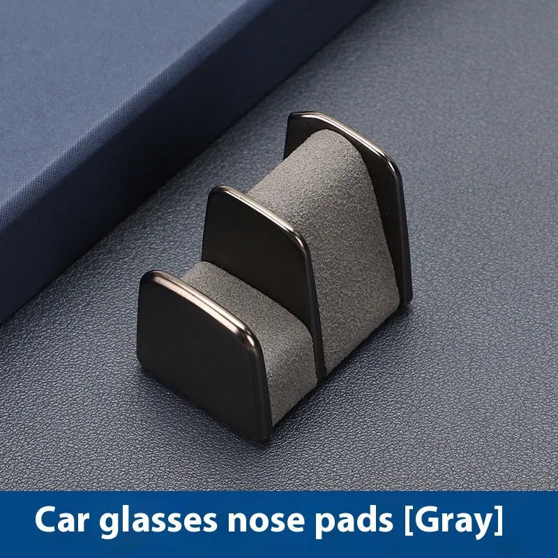 Zinc alloy and leather car dashboard glasses clip in black holding sunglasses securely