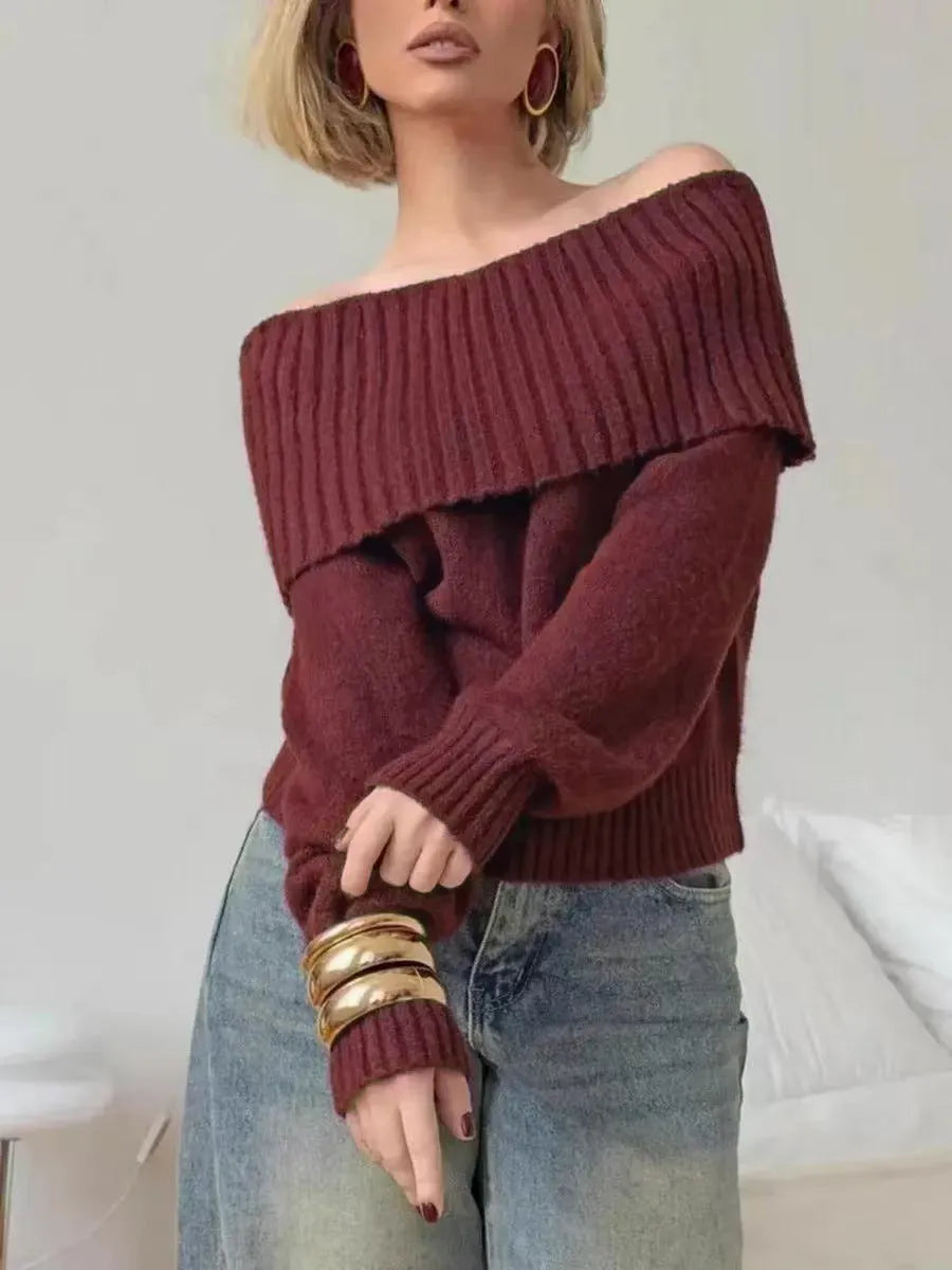 Grey off-the-shoulder strapless pullover sweater with a 3D pattern texture.