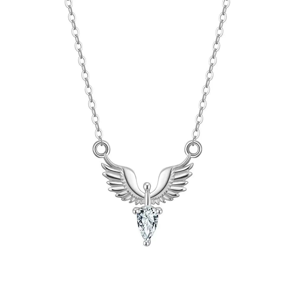 Sterling silver eagle pendant necklace with an O-ring chain on a model, showing white gold colour finish.