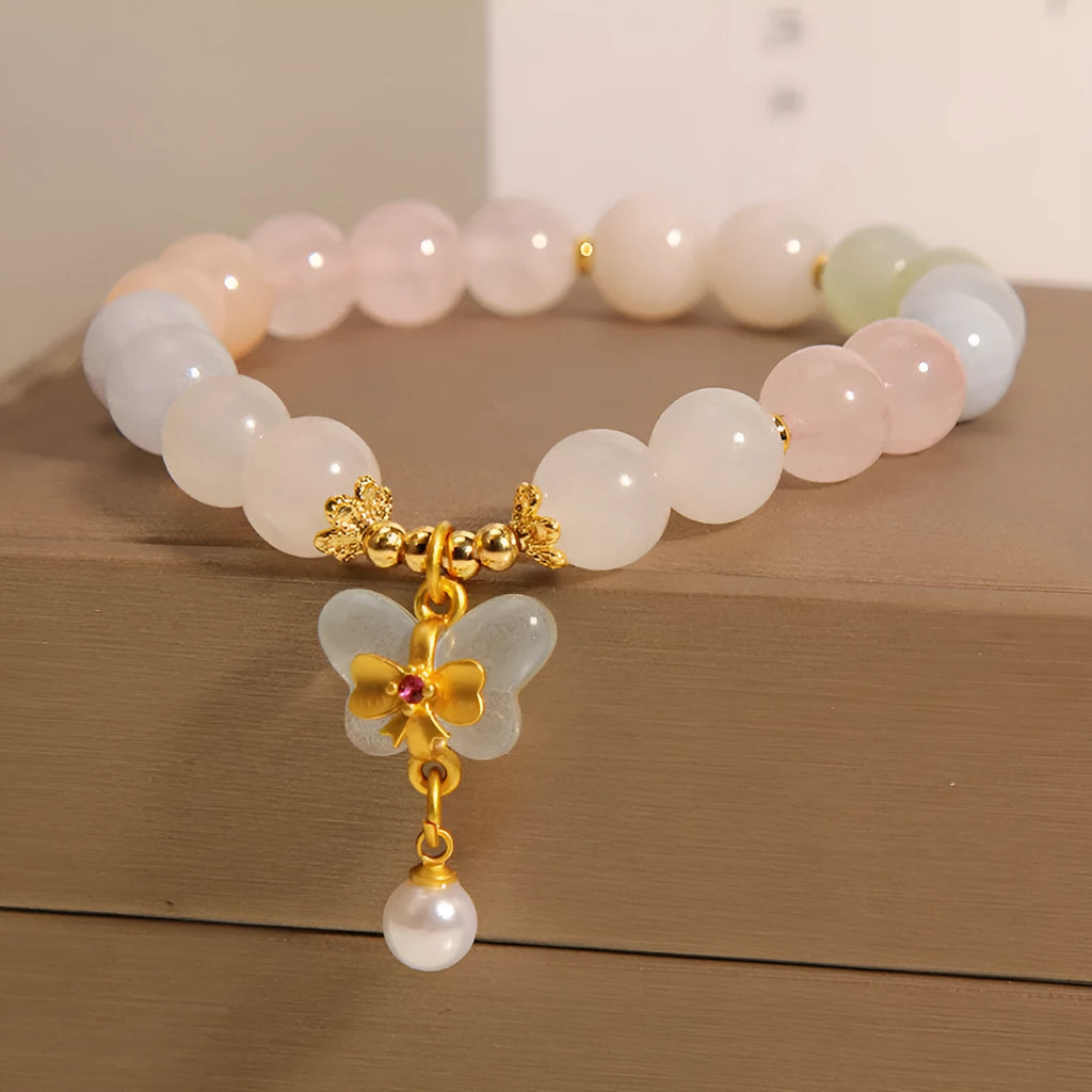 Women's crystal bracelet with colourful Morganite stone and butterfly pendant jewellery