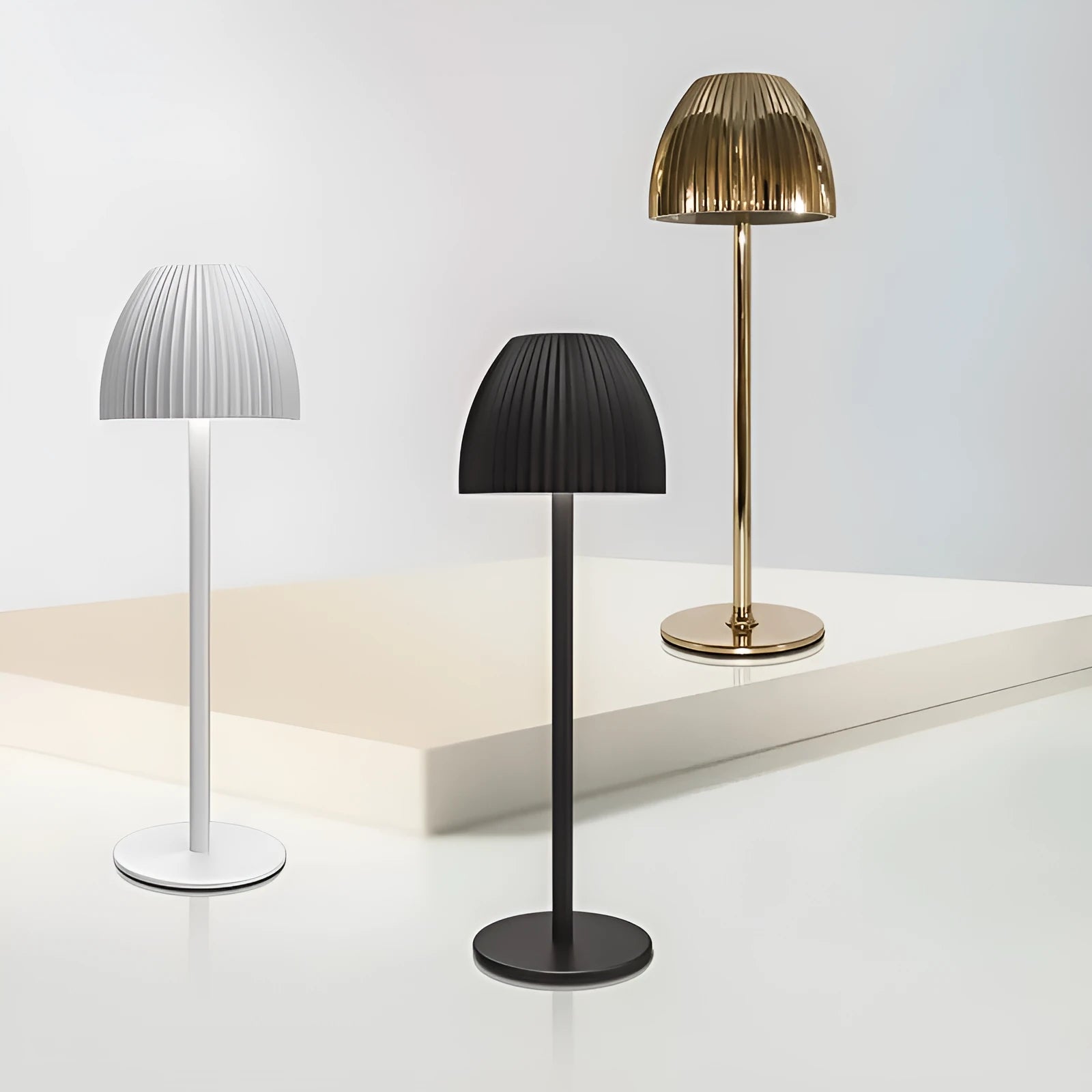 Small modern night lamp with dimming controls and thin round base in black or white colour options