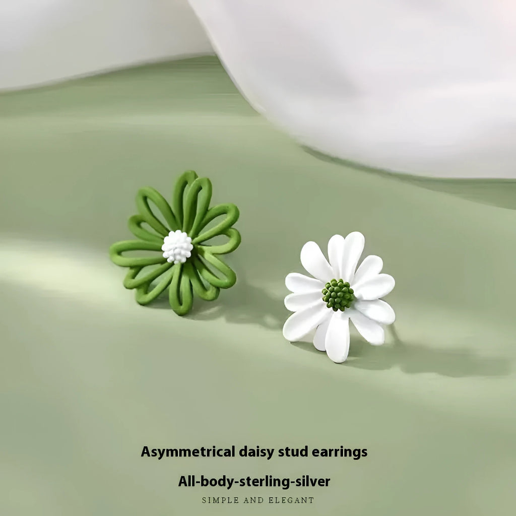 Close-up of cartoon-style flower stud earrings in alloy, shown in blue and orange two-tone colour combination.