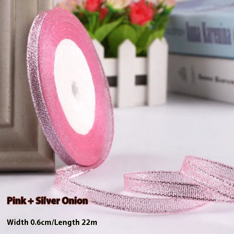 Roll of polyester gift packaging ribbon with 0.6cm width and 22 metre length in various colour options