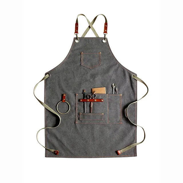 Canvas apron with cross strap back design in camel colour for baking and gardening protection