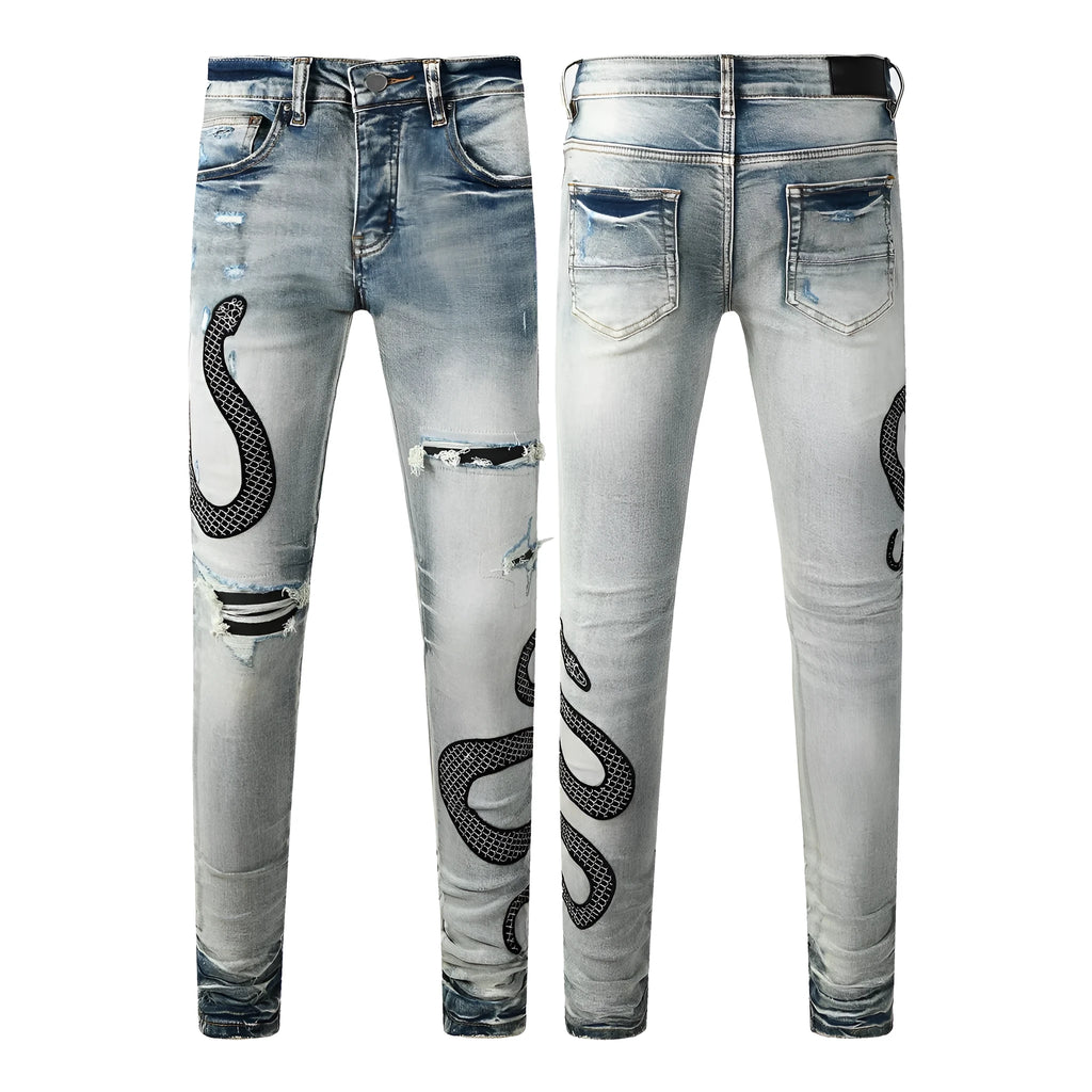Men's blue distressed skinny jeans with wash finish showing button fly and slim fit