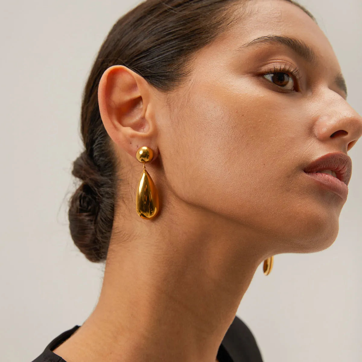 Gold stainless steel water drop hemisphere earrings with geometric design
