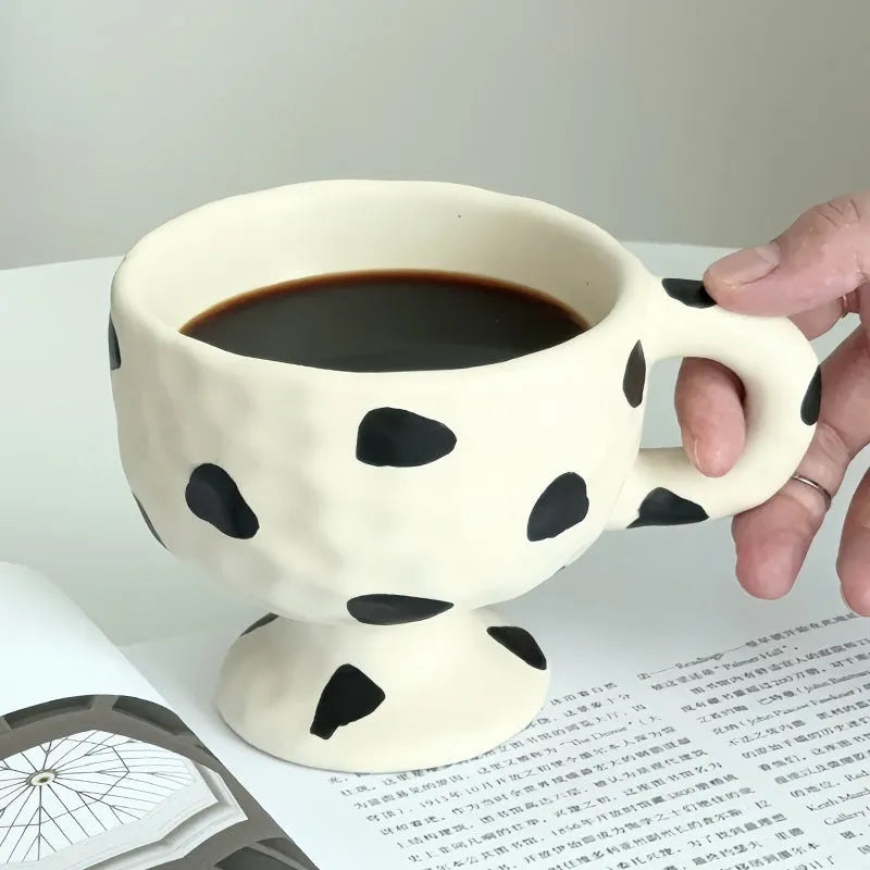 Hand-pinched irregular ceramic mug in solid colour with 250ml capacity