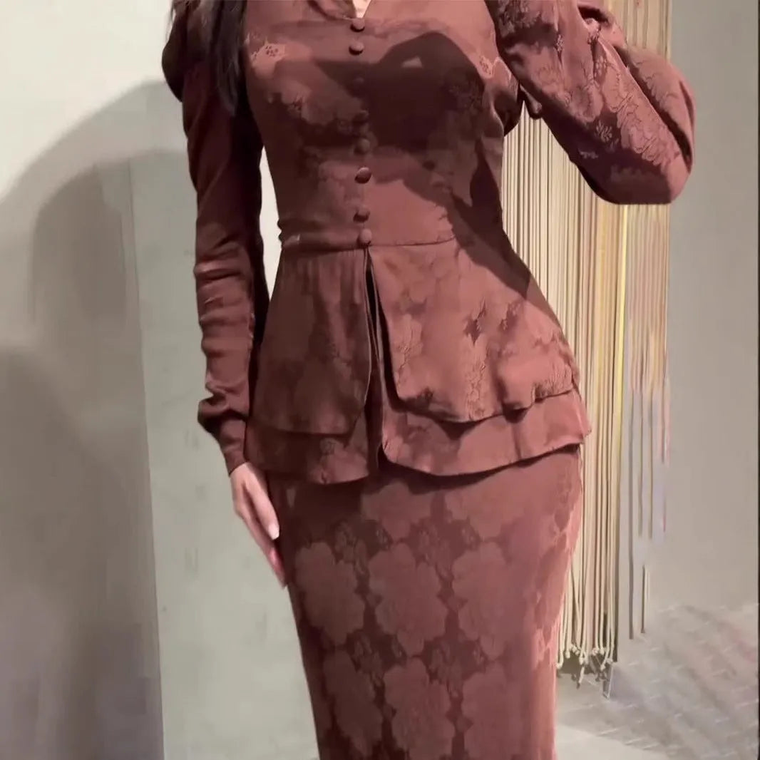 Dark brown retro dress with floral print, long sleeves, button detail, and a fake two-piece silhouette.