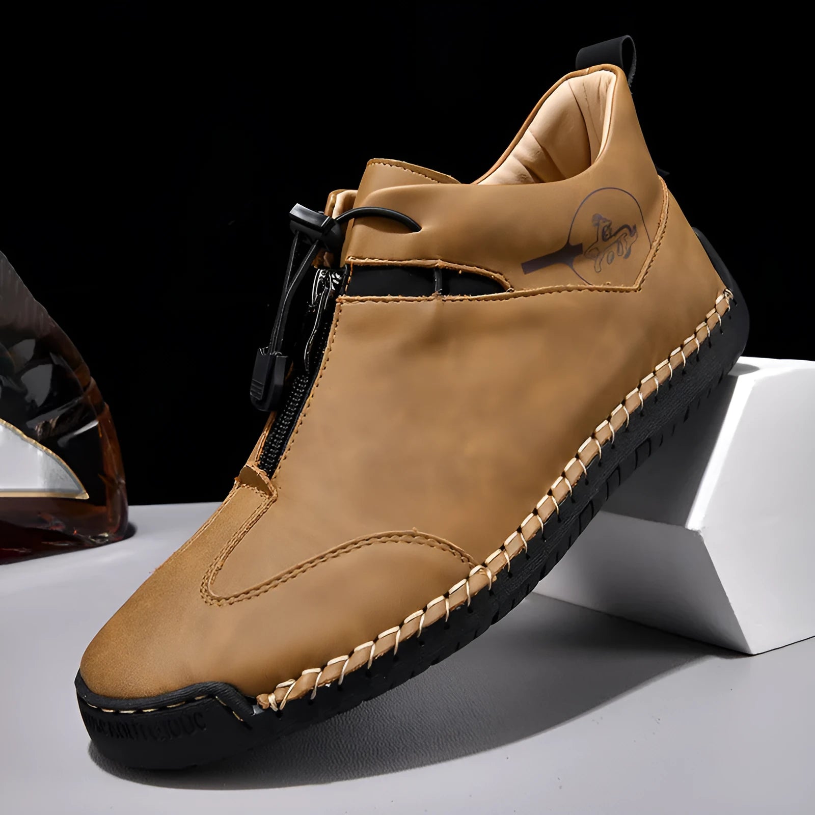 Men's black casual leather shoes with a round toe, rubber sole, and mid-height heel.