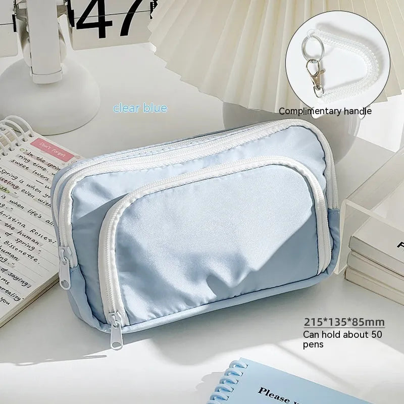 Double-layer pencil case in solid colour with gift handle showing dimensions 215mm x 135mm x 85mm
