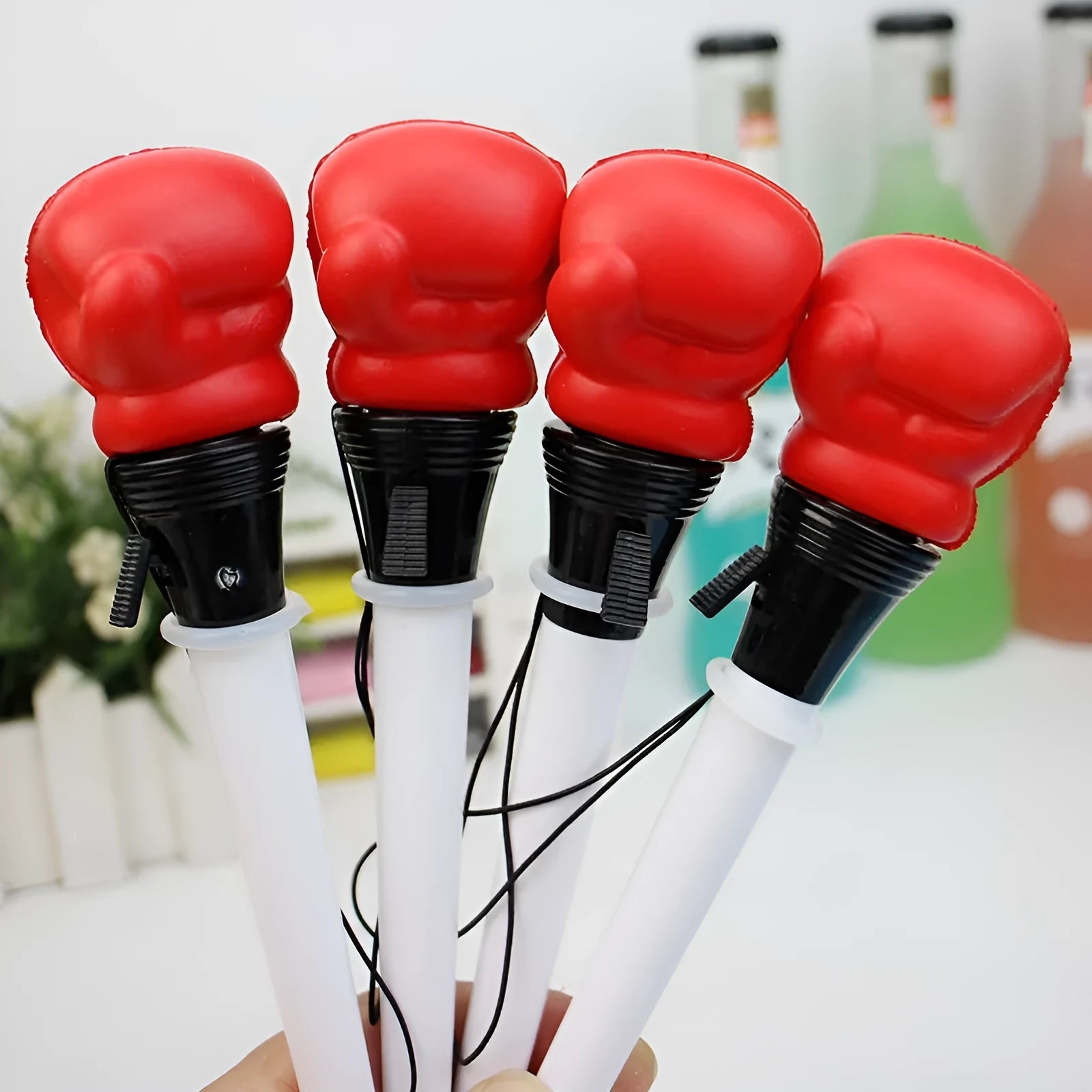 Four pressure relief boxing pens with black ink and 0.7mm bullet tips showing plug-in sleeve design