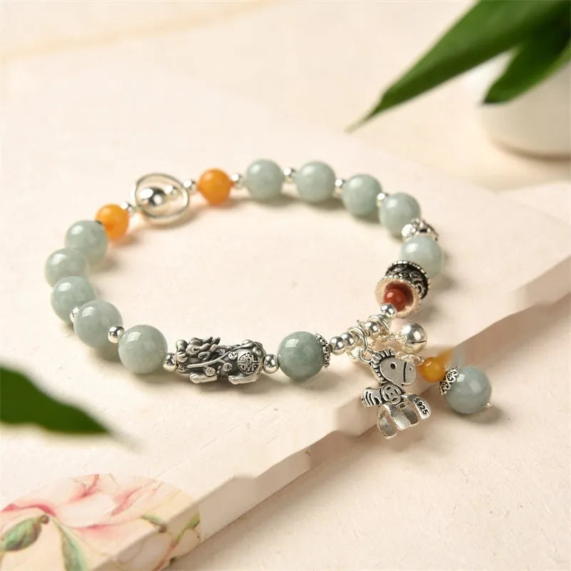 Natural emerald jade vintage bracelet with alloy fittings and retro styling