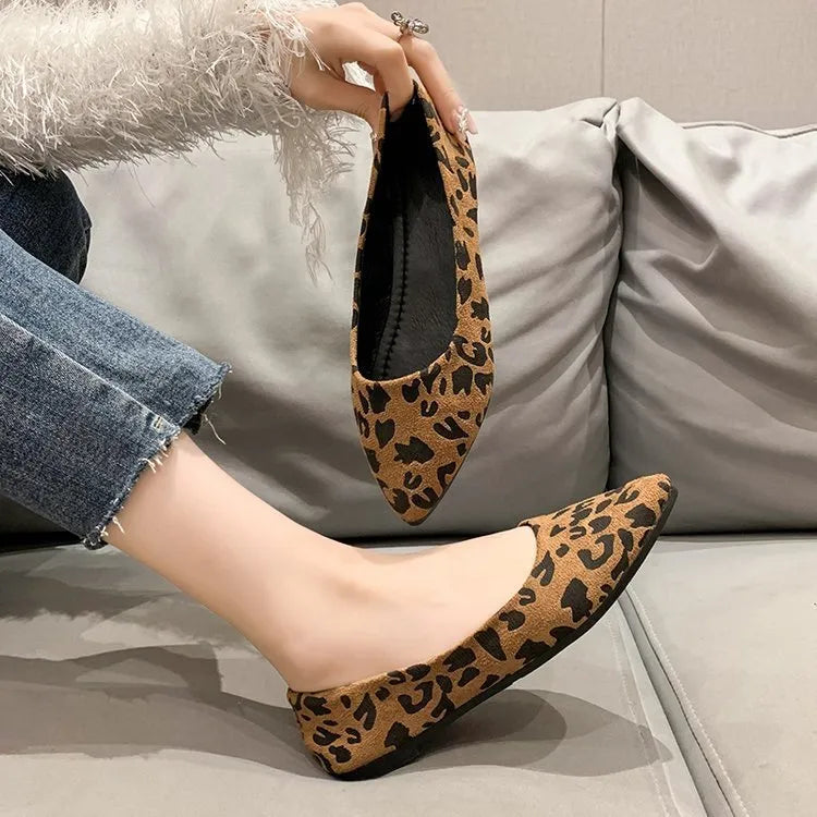 Women's leopard print flat pumps with pointed toe design and low heel