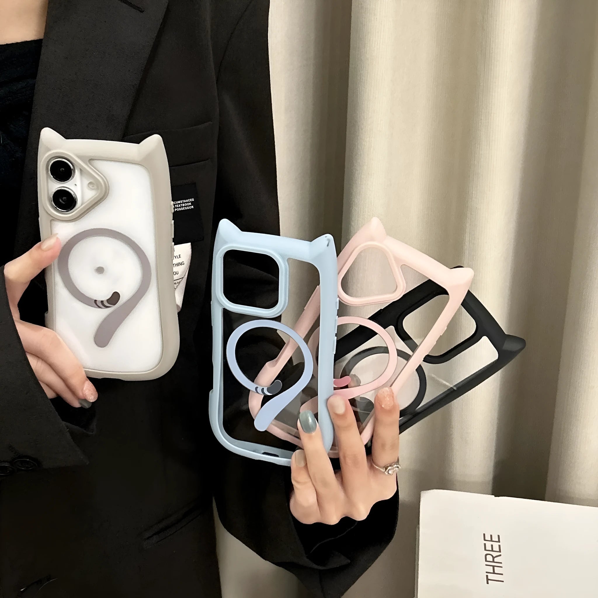 Transparent acrylic and TPU two-in-one phone case for iPhone 17 series in black, shown with magnetic function