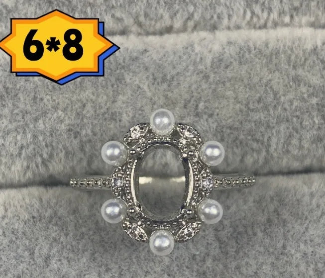 Oval denier ring with open mouth design and five-pointed star detail on electroplated copper